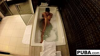 sexy jezebelle bond films her big tits and ass in the bath, teasing with her pussy