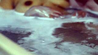 The shy teen student kisses her boyfriend passionately in the apartment.