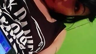 She touches her wet pussy during striptease