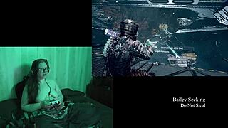 Naked brunette plays Deadspace, showcasing her big natural tits in part eight.