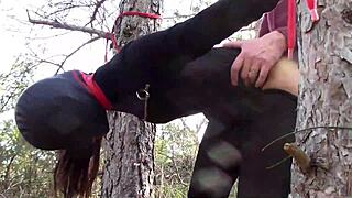 hey, tied to a tree in pantyhose and heels for rough outdoor banging!
