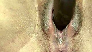 Latina girl boldly plays with big black dildo in close POV.