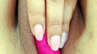 A young woman showcases her smooth, peachy shaved intimate area