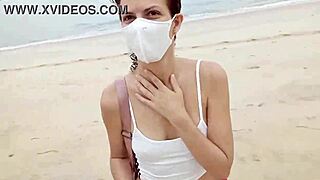 Masturbating On The Beach With Small Tits Exposed.