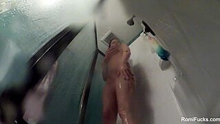 romi rain enjoys a steamy shower, touching her big tits and pussy