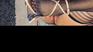 kenia tease video wearing black stockings and red satin dress