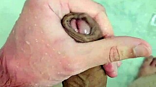 I'm jerking off in the shower, feeling so good.