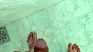 I'm jerking off in the shower, feeling so good.