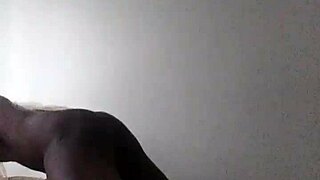 a latino guy sucks a black shemale's big cock in a deepthroat session