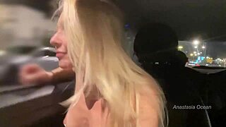 The hotwife rides topless in the car, flashing tits to exhibitionists outdoors