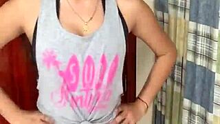 Beautiful slim girl teaches sexy outfits in a casual way