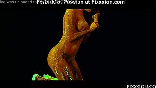 brunette goddess glows in the dark while masturbating with dildo