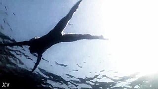 Supernatural sexy bikini girl swimming in water