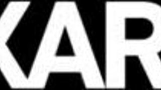 Redhead lesbian makes girlfriend's big tits bounce while muff diving.