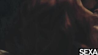 Redhead lesbian makes girlfriend's big tits bounce while muff diving.