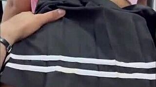 Why does the university student give in to her classmate