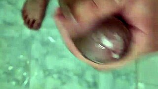 A young Brazilian twink enjoys a solo shower, his penis getting wet and babado