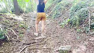 This perfect body girl strolls through woods showing off her assets