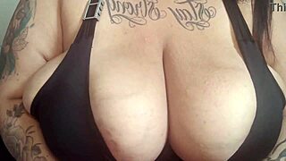 mary jhuana playing with her saggy pierced tits in bedroom