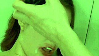 Busty slut tied up gags on toy during assfucking