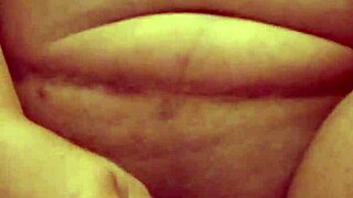 Rea masturbates with dildo in pussy and sucks it wearing sexy mask