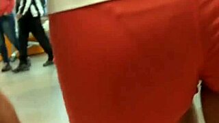 Hot girl with nice ass in tight shorts feels excitement in market