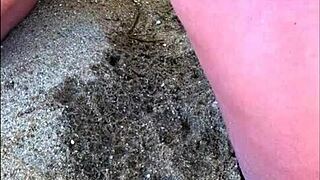 my wife taking a long pee on the beach today