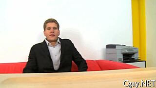 two guys having intense anal sex in a casual setting