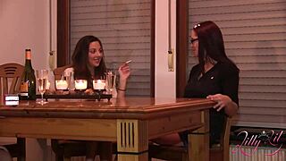 Are Three Girls Having A Strap On Party With Big Dildo On Desk?