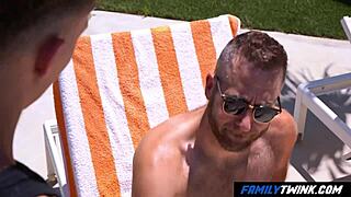 familytwink - spicy stepdad lounges by the pool soaking up sun.