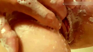 Hey, wanna see this 50-plus wife washing her natural tit hangers and pussy? Can you handle this mature homemade vid?