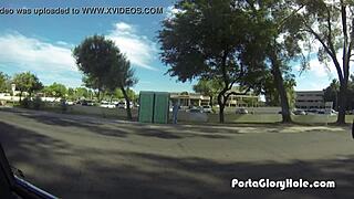 Porta gloryhole redhead mouth pumped full of cum in public outdoor spot