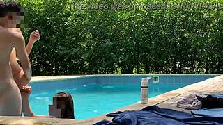 natasha and megan tan while guy cleans pool then swim naked