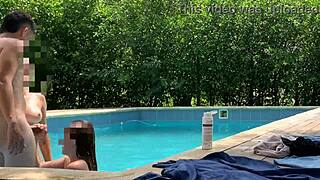 natasha and megan tan while guy cleans pool then swim naked