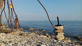 Feeling intense orgasm as nude Moana cosplayer fucks dildo outdoors