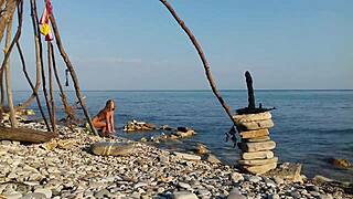 Feeling intense orgasm as nude Moana cosplayer fucks dildo outdoors