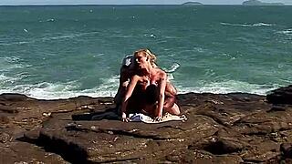 busty blonde tourist gets anal on the rocks