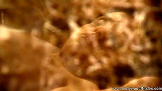 beautiful brunette undresses and dances in erotic striptease