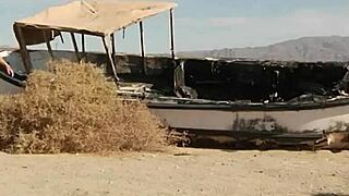 The naughty blonde casually handles two cocks in a threesome blowjob session