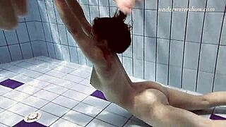 Iva Brizgina and Paulinka kiss passionately in pool