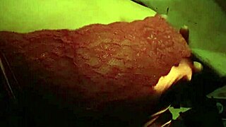 This teen 18+ is sucking on black tits in a red tank top, feeling so bisexual and excited.