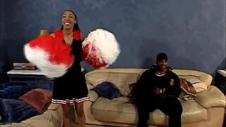 Ebony cheerleaders kissing in miniskirts!