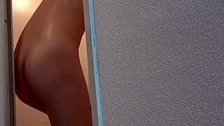 himeno amasaki strips naked in her private japanese shower on webcam.