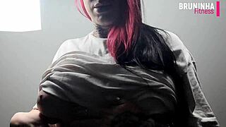 Check out this athletic Brazilian cowgirl showing off her silicone tits.