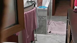 Donna leaves window open during shower, I secretly film her
