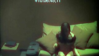 Sexy babe relaxes on sofa with hidden cam view