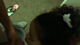 Attractive ebony woman in a black-themed amateur scene