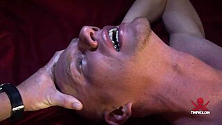 A big ass gay gets a double penetration and a facial in a gangbang