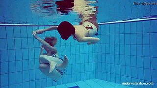 marusia and melisa darkova dive into steamy underwater lesbian play