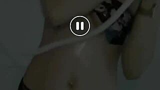 Asian beauty exposed by the moonlight while taking a shower